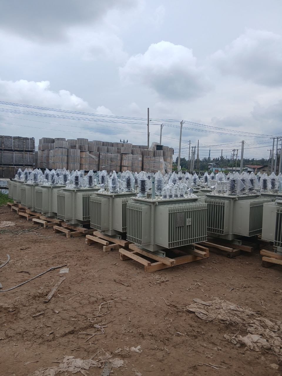 Massive rows of newly delivered substation transformers at the Ethiopia project site